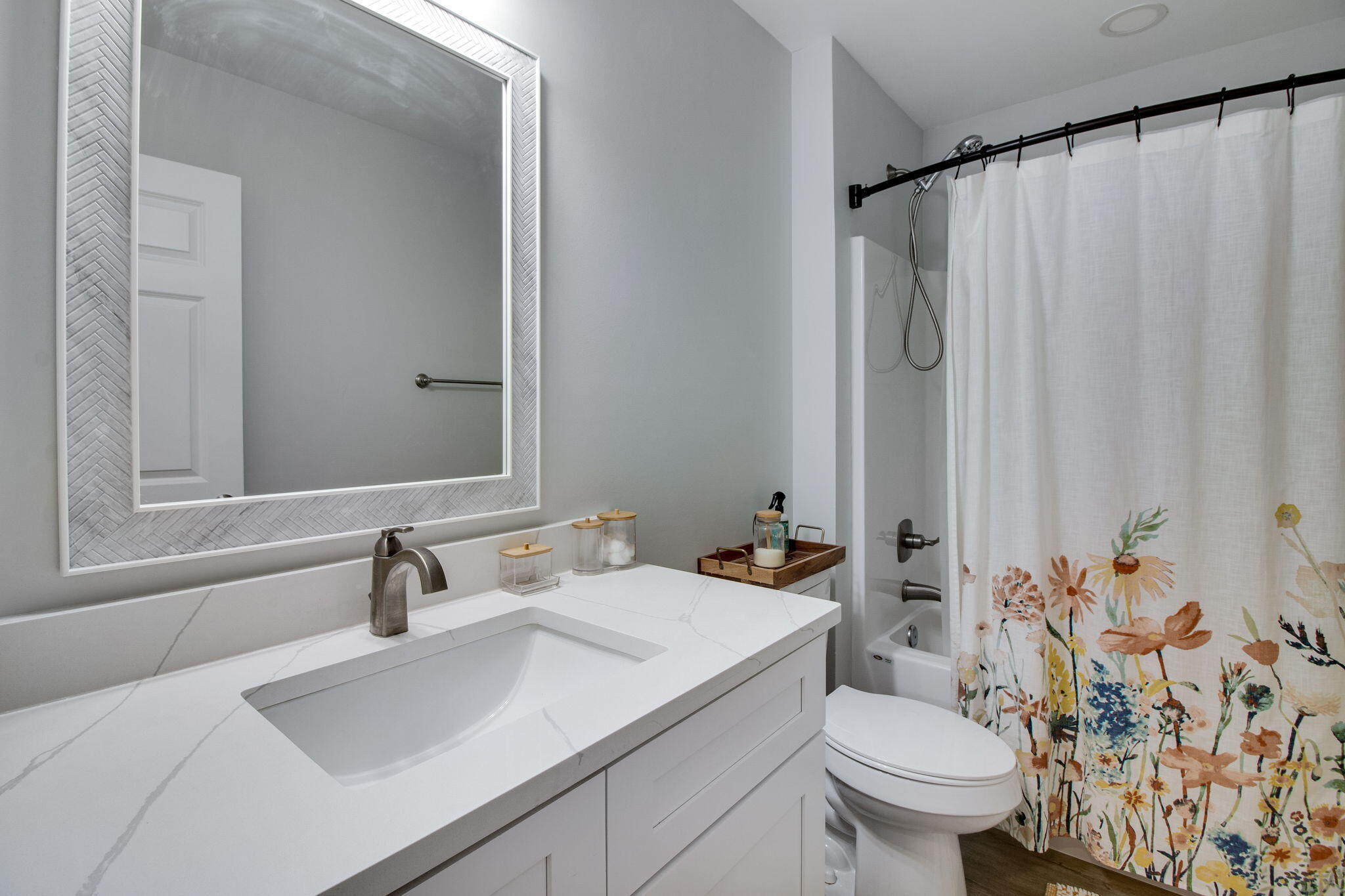 43 Crocus Avenue DeFuniak Springs, FL 32433 - Photo 14 of 20 a bathroom with a sink a toilet and a mirror