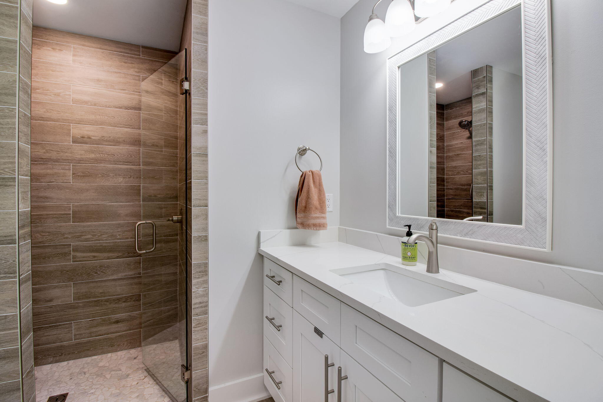 43 Crocus Avenue DeFuniak Springs, FL 32433 - Photo 17 of 20 a bathroom with a sink and a mirror