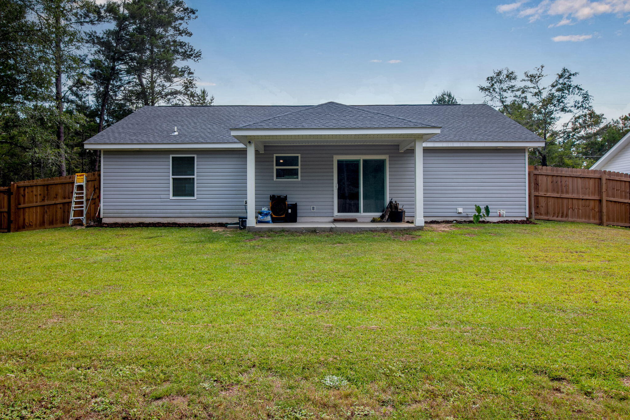 43 Crocus Avenue DeFuniak Springs, FL 32433 - Photo 19 of 20 a front view of house with yard and seating area