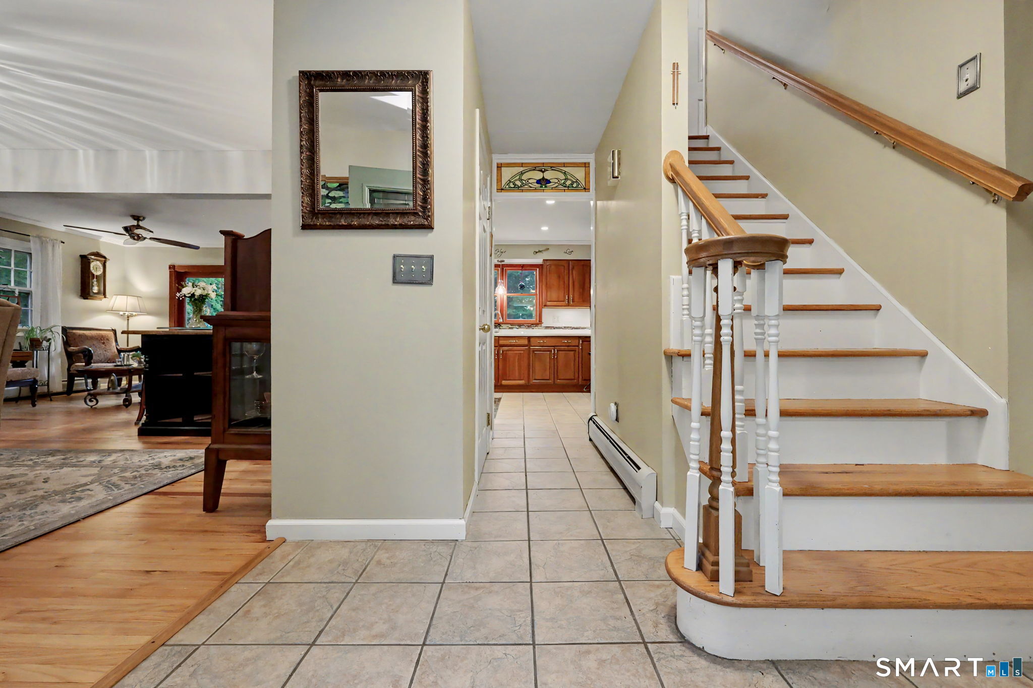 571 Wheeler Road Monroe, CT 06468 - Photo 4 of 40 a view of entryway and hall with wooden floor