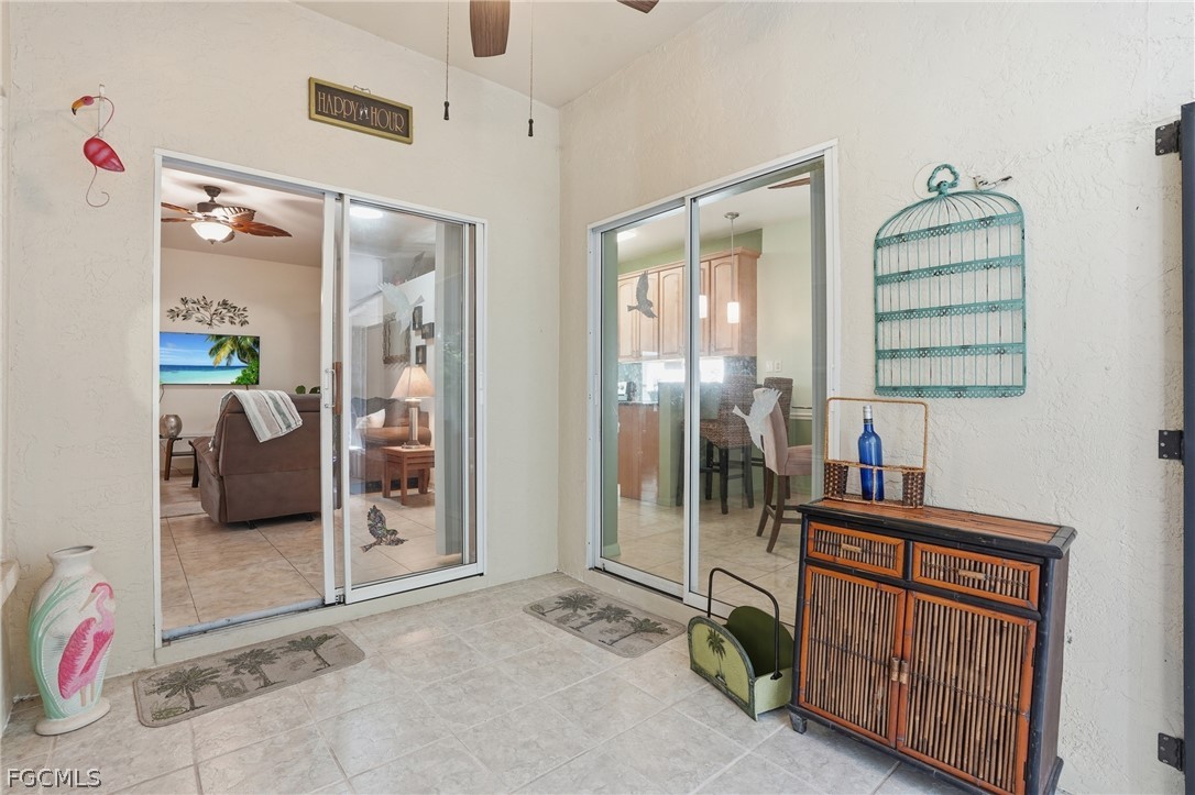 10730 Rio Mar Circle Estero, FL 33928 - Photo 22 of 47 a view of entryway with livingroom and furniture