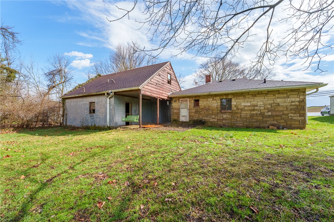5839 Shaker Road Franklin, OH 45005 - Photo 13 of 18 This charming home offers a spacious yard and a classic exterior, perfect for peaceful living.