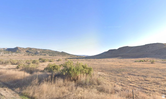 750 East Little Valley Road North, Unit 3 Vernal, UT 84078 - Photo 1 of 6 Mountain view featuring rural landscape