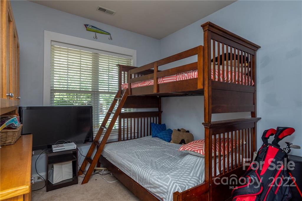 8110 Strandhill Road Huntersville, NC 28078 - Photo 13 of 23 a bedroom with furniture and a window