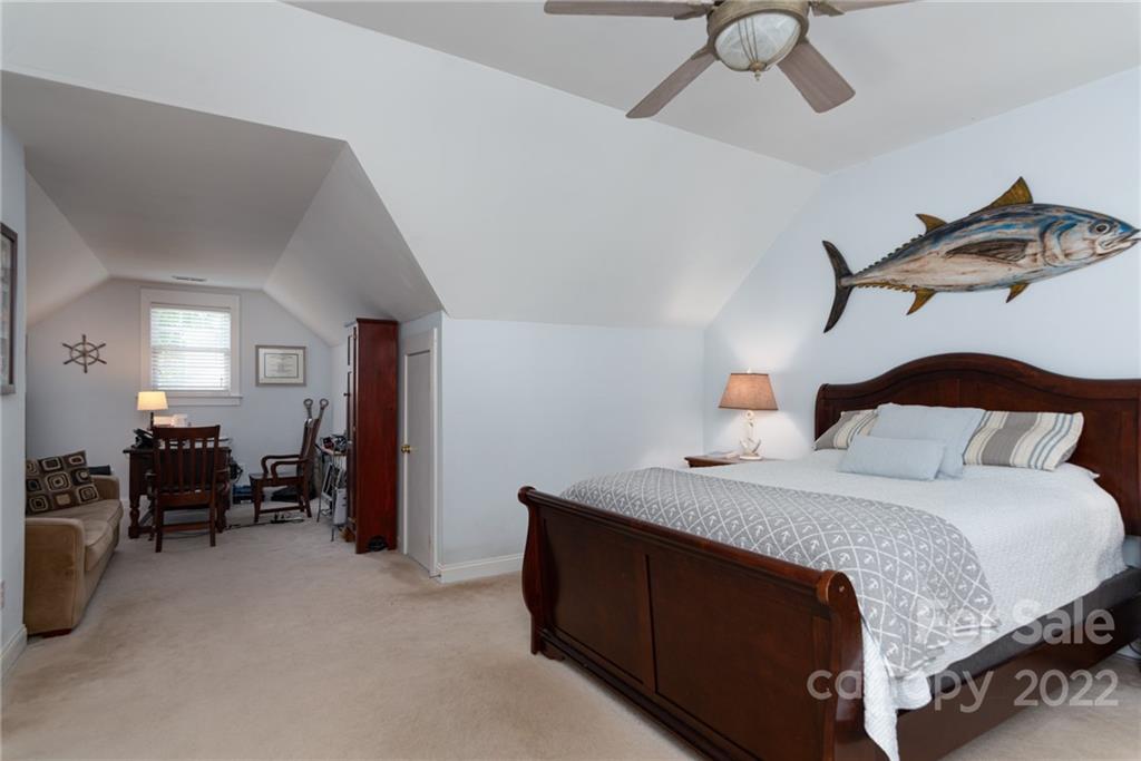 8110 Strandhill Road Huntersville, NC 28078 - Photo 15 of 23 a bedroom with a bed and ceiling fan