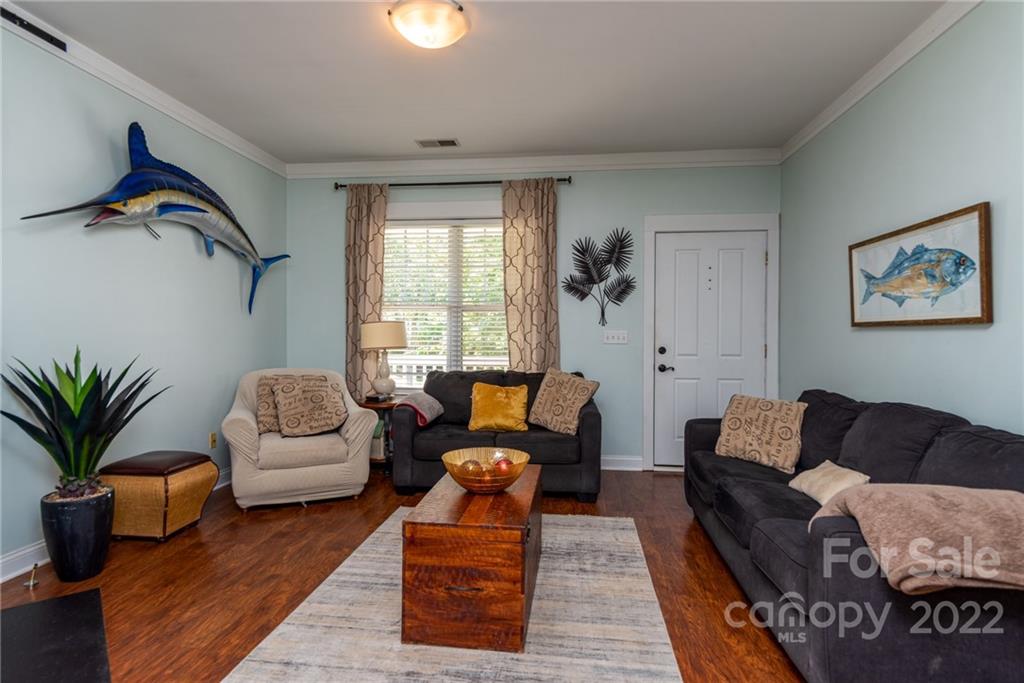 8110 Strandhill Road Huntersville, NC 28078 - Photo 6 of 23 a living room with furniture or couch and a potted plant