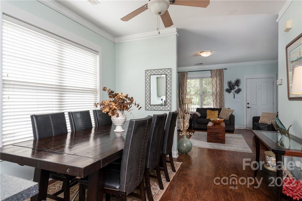 8110 Strandhill Road Huntersville, NC 28078 - Photo 8 of 23 a view of a dining room with furniture and wooden floor