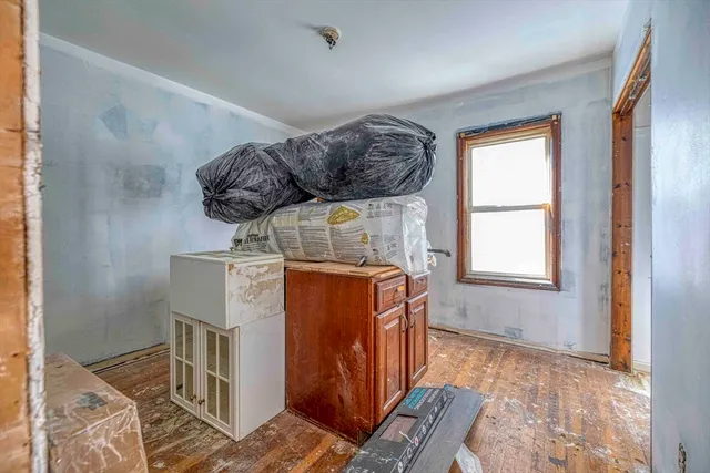 a aerial view of a house with swimming pool and patio