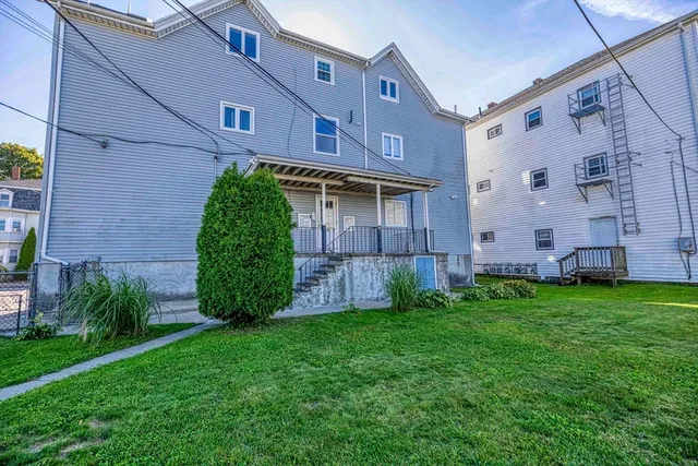 a view of a back yard of the house