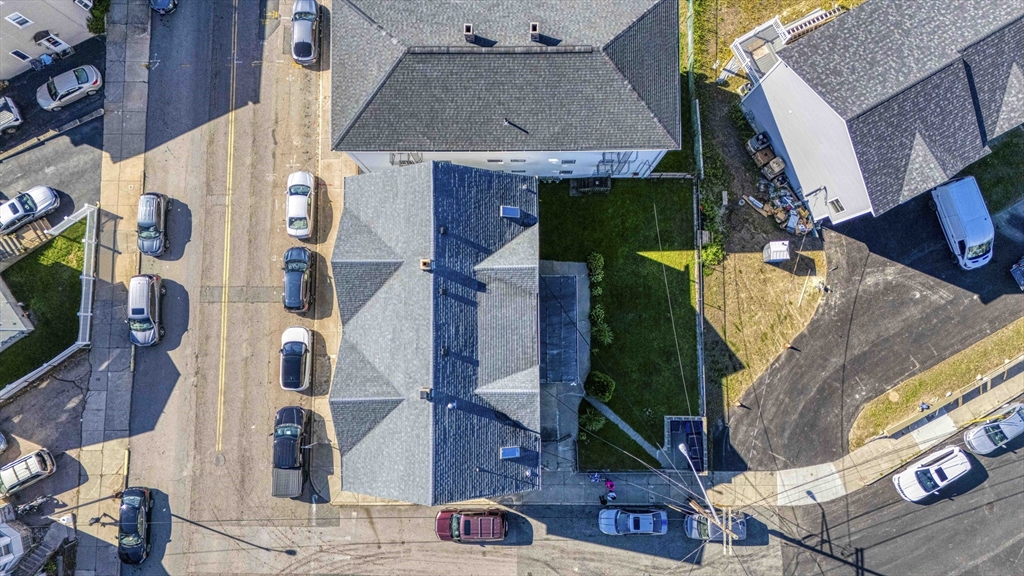 1273-1279 South Main Street Fall River, MA 02724 - Photo 32 of 33 an aerial view of multiple houses with outdoor space