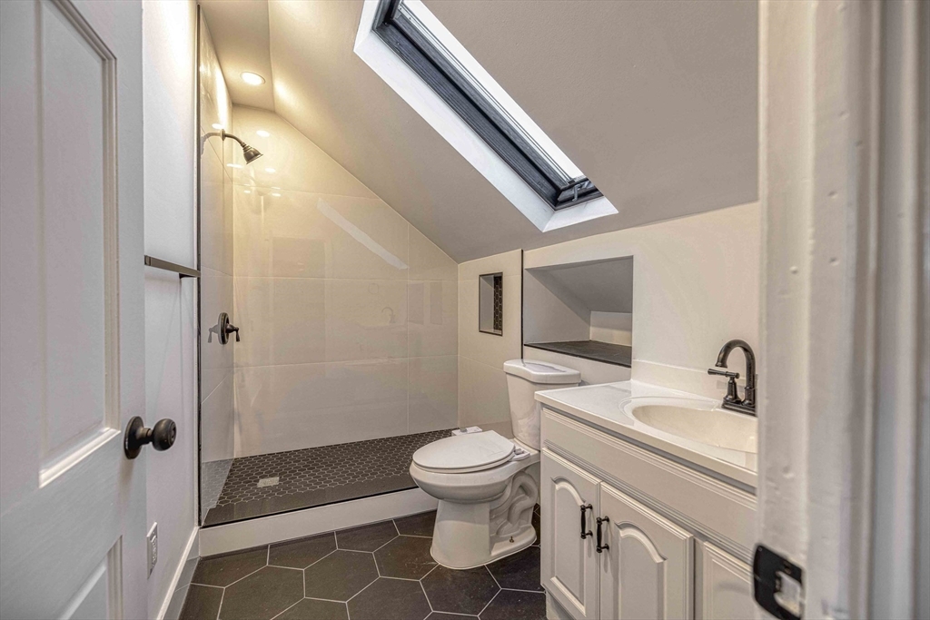 1273-1279 South Main Street Fall River, MA 02724 - Photo 6 of 33 a bathroom with a sink a toilet and shower