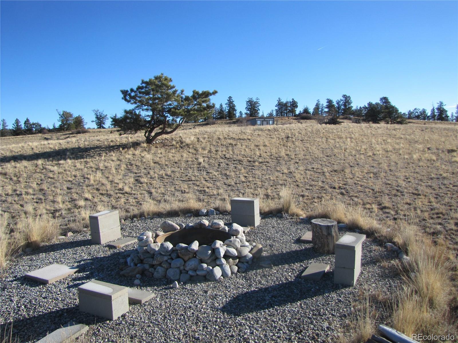 2767 Fitzsimmons Road Hartsel, CO 80449 - Photo 18 of 28 a view of terrace with outdoor seating and city view
