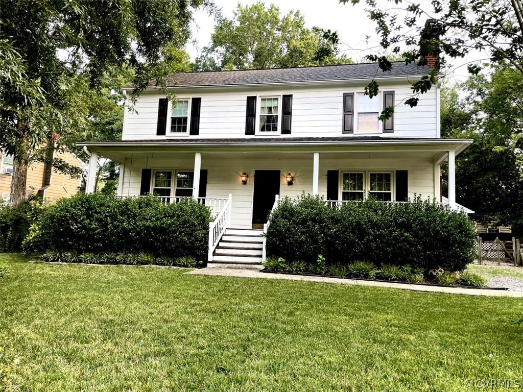 1200 Mapleton Circle Henrico, VA 23229 - Photo 1 of 20 a front view of a house with a garden