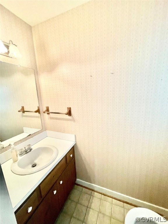 1200 Mapleton Circle Henrico, VA 23229 - Photo 13 of 20 a bathroom with a sink and a mirror
