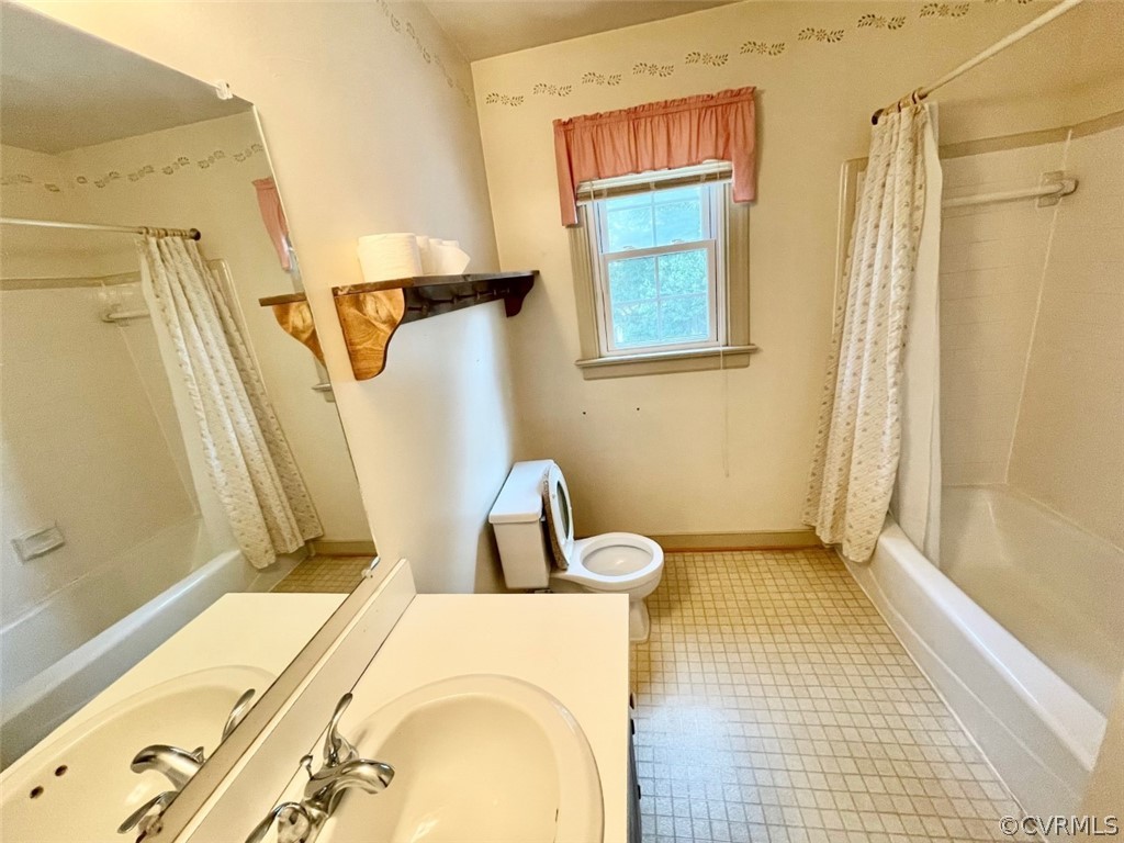 1200 Mapleton Circle Henrico, VA 23229 - Photo 20 of 20 a bathroom with a tub a sink and a shower