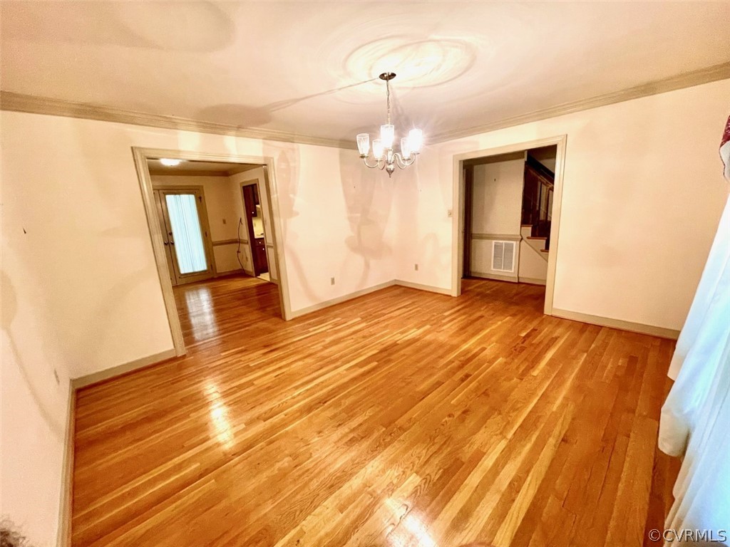 1200 Mapleton Circle Henrico, VA 23229 - Photo 8 of 20 a view of a room with wooden floor and a ceiling fan