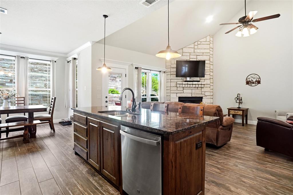 1024 Tex Lane Springtown, TX 76082 - Photo 14 of 40 a kitchen with sink stove top oven and microwave