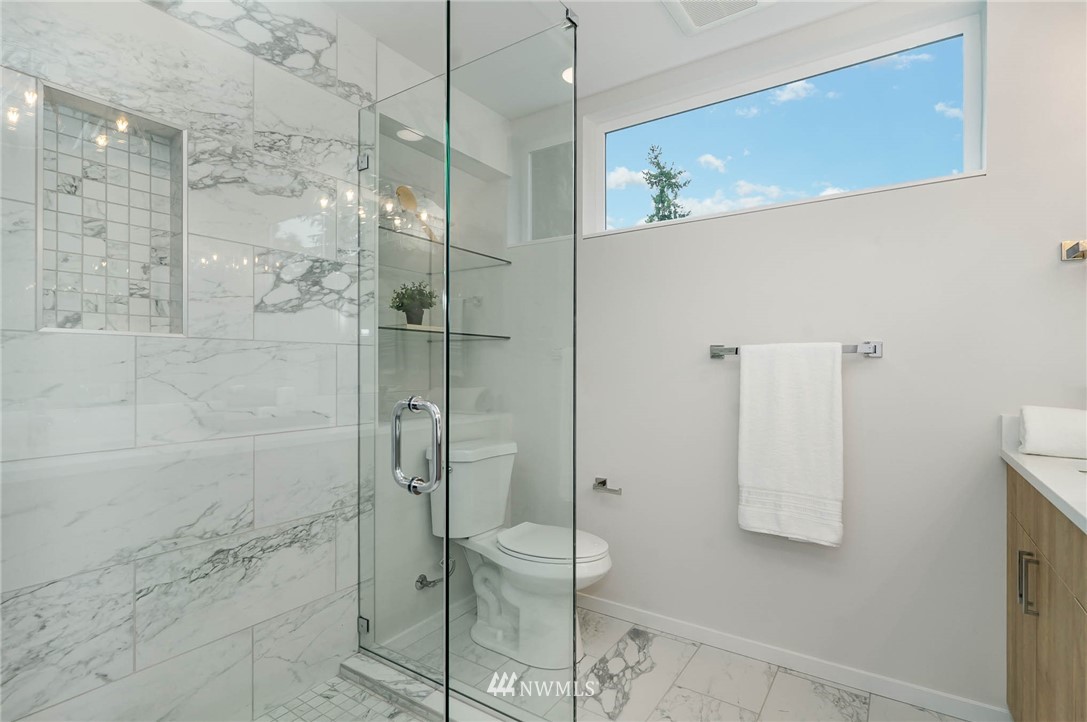 941 North 91st Street, Unit B Seattle, WA 98103 - Photo 19 of 23 a bathroom with a shower