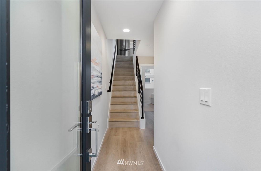 941 North 91st Street, Unit B Seattle, WA 98103 - Photo 3 of 23 a view of a hallway with the entryway