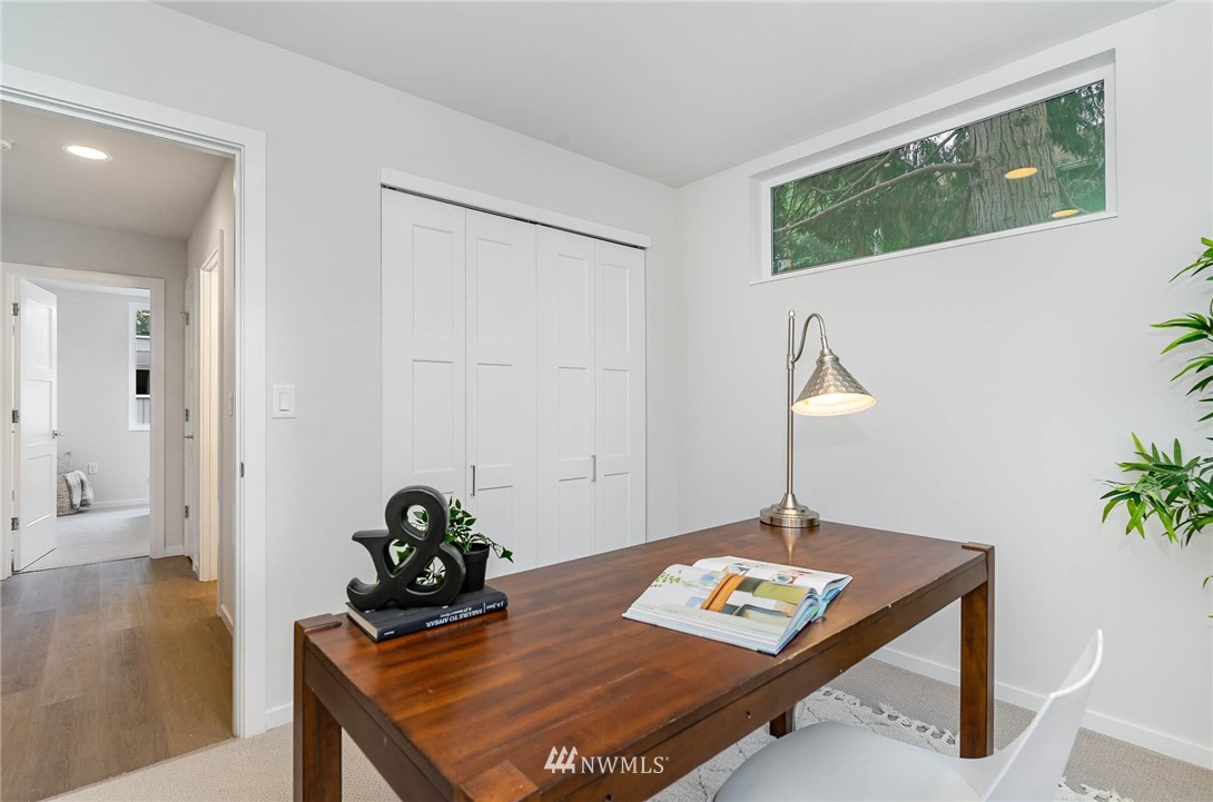 941 North 91st Street, Unit B Seattle, WA 98103 - Photo 8 of 23 a view of a workspace with furniture