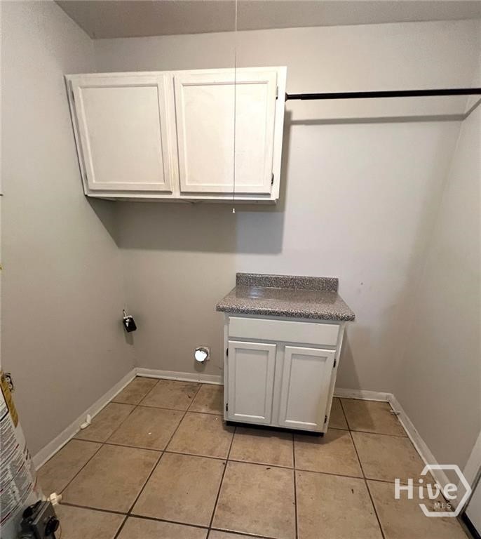 1519 East 31st Street Savannah, GA 31404 - Photo 6 of 16 Laundry roon with cabinetry
