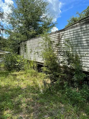 a view of building with green space