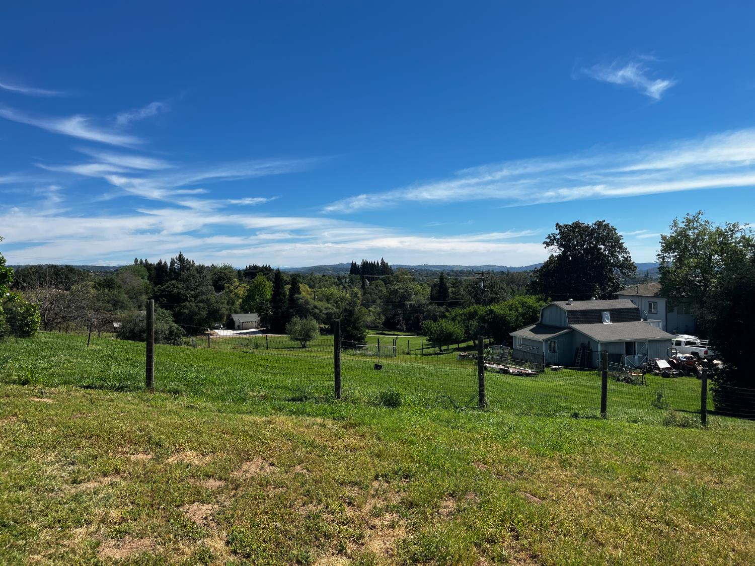 0 Butler Road Penryn, CA 95663 - Photo 17 of 19 a view of a park with swings and slides