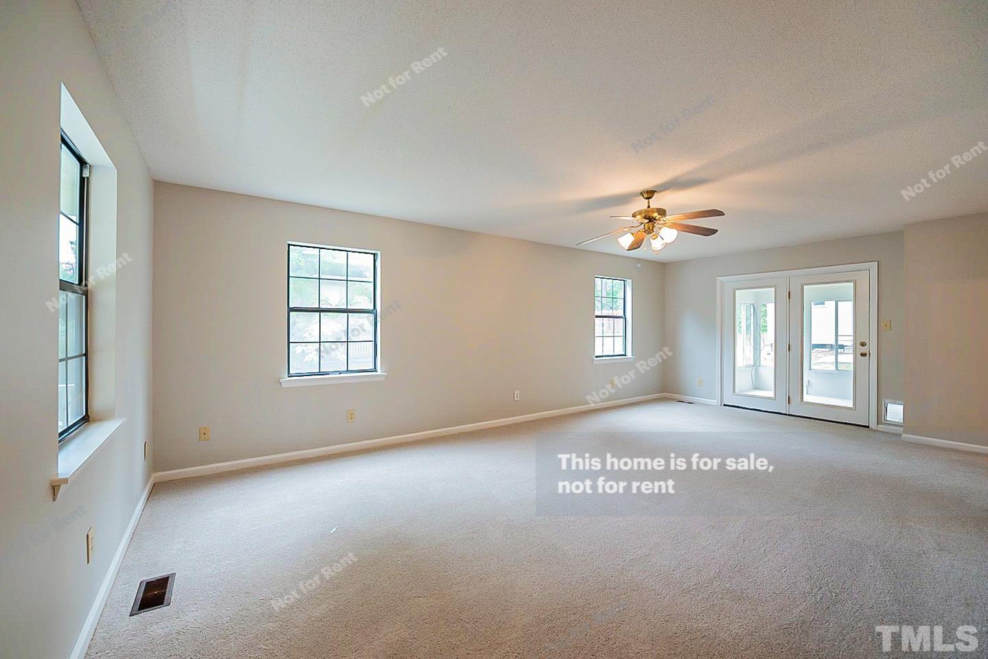 837 Horton Road Durham, NC 27704 - Photo 3 of 19 a view of an empty room with a window