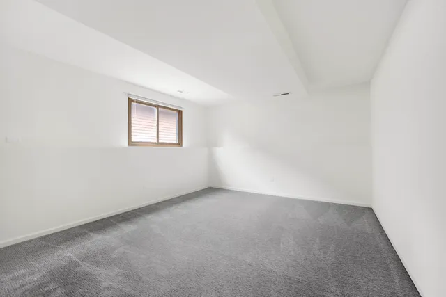 a view of an empty room and entryway