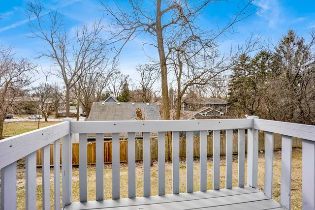 a view of a wooden fence