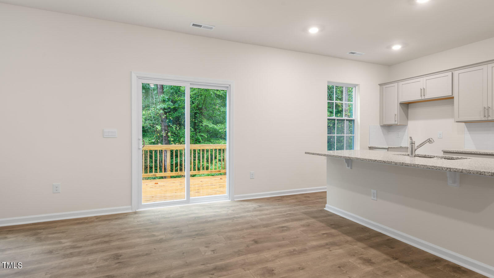 3125 White Memorial Church Road Willow Spring, NC 27592 - Photo 11 of 56 a view of a kitchen with a sink and a window