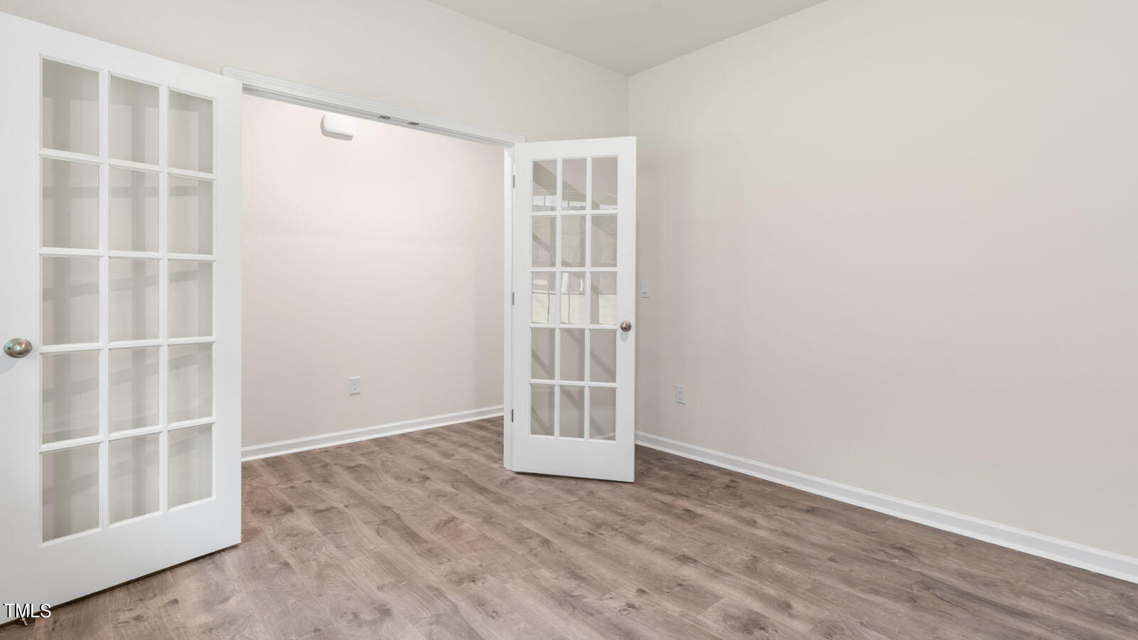 3125 White Memorial Church Road Willow Spring, NC 27592 - Photo 13 of 56 an empty room with windows