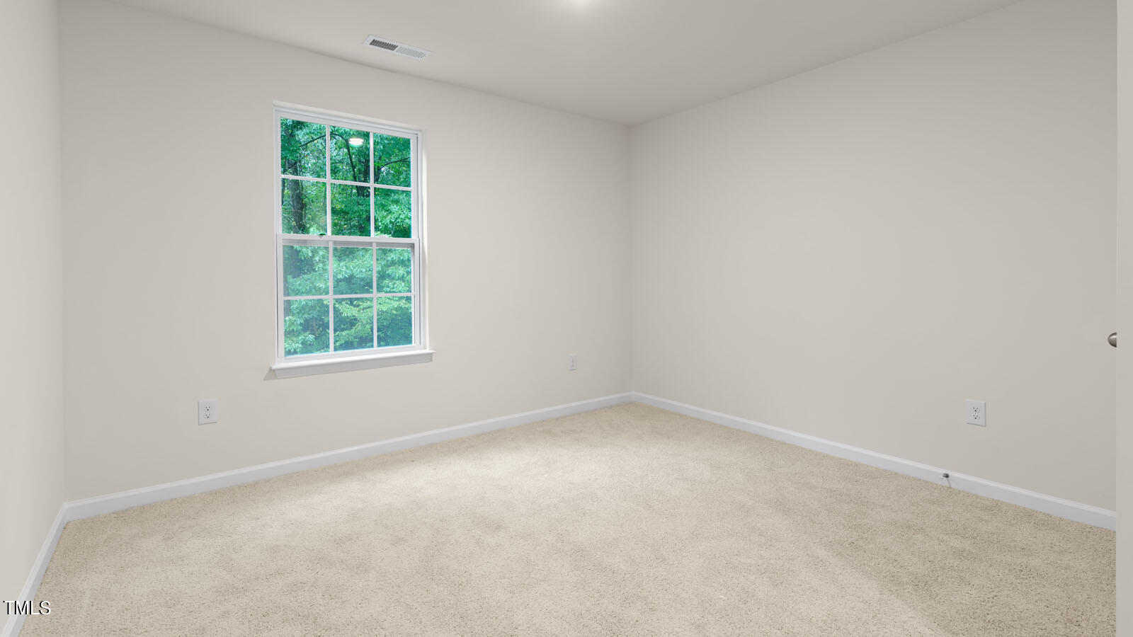 3125 White Memorial Church Road Willow Spring, NC 27592 - Photo 21 of 56 an empty room with a window