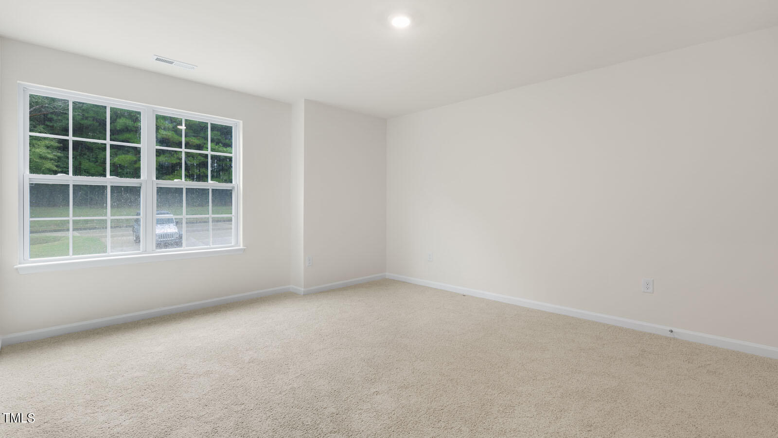 3125 White Memorial Church Road Willow Spring, NC 27592 - Photo 25 of 56 an empty room with a window