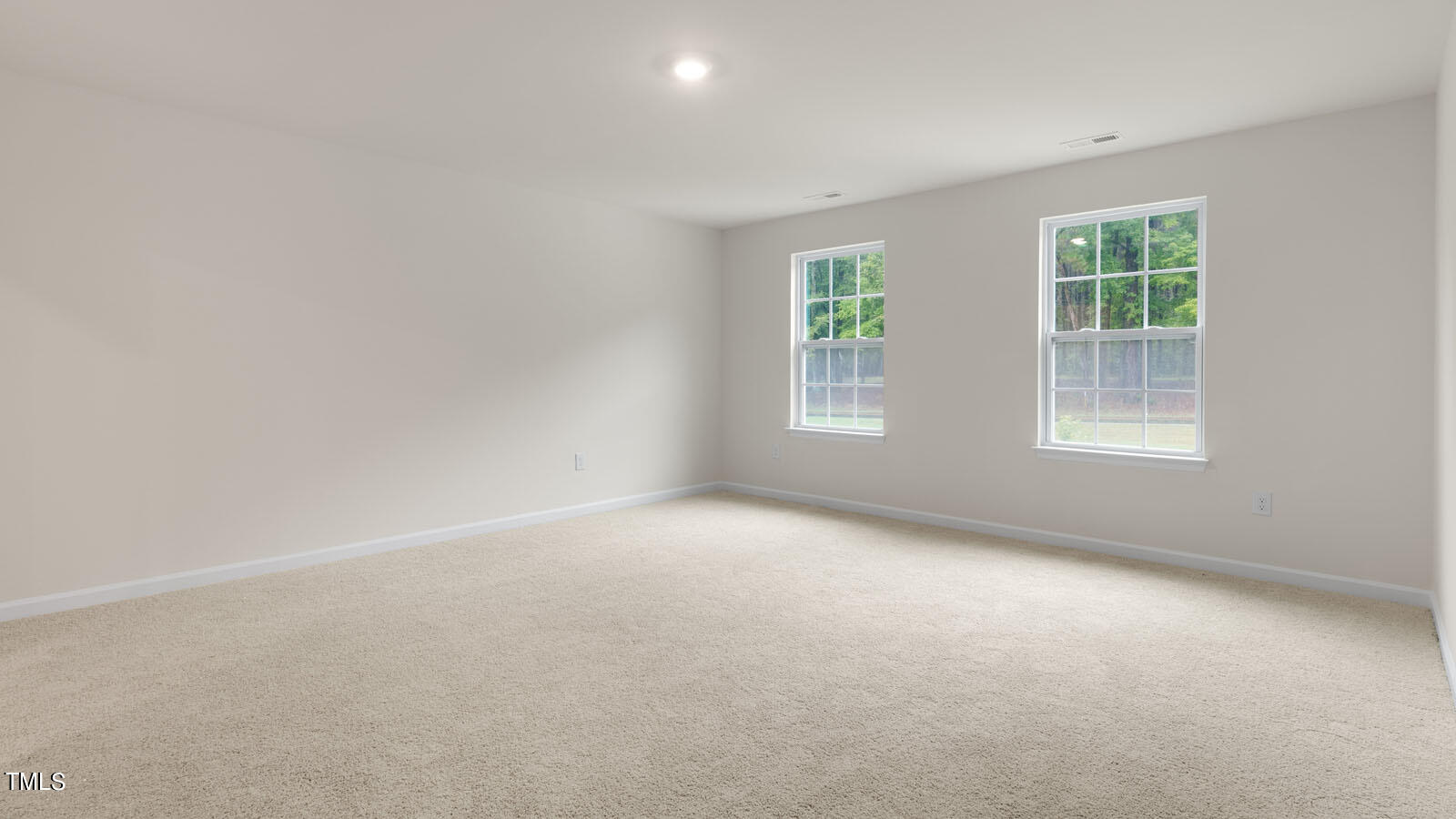 3125 White Memorial Church Road Willow Spring, NC 27592 - Photo 27 of 56 an empty room with windows