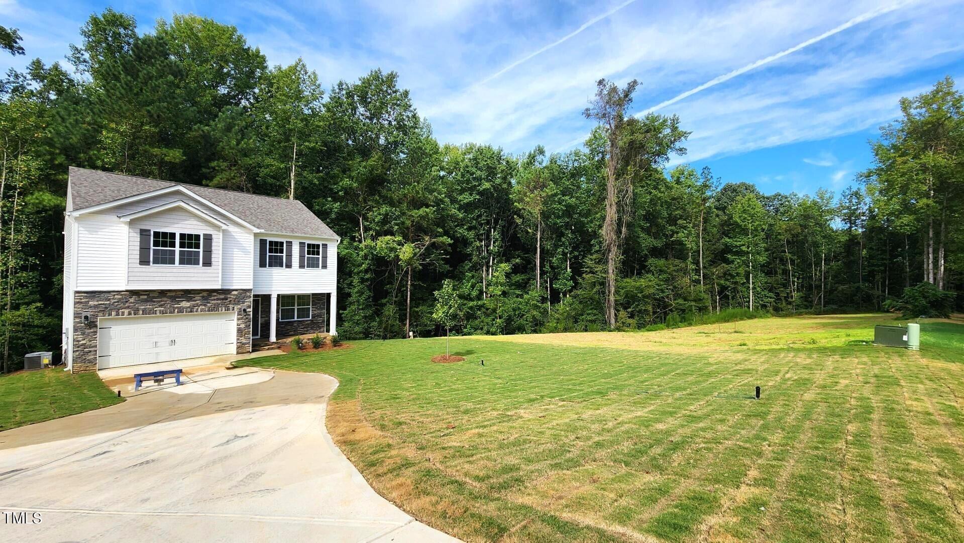 3125 White Memorial Church Road Willow Spring, NC 27592 - Photo 5 of 56 a view of a swimming pool with a patio
