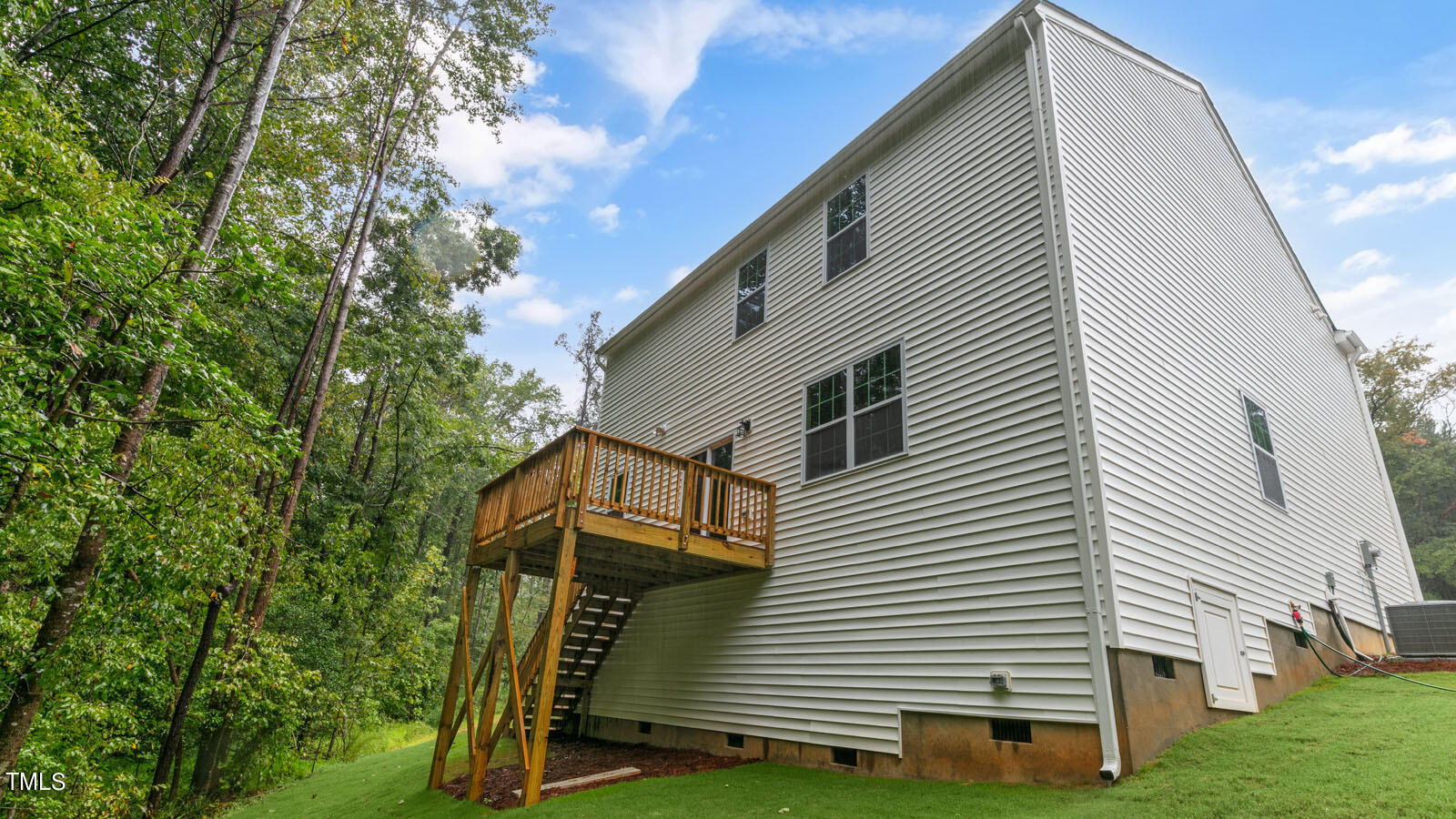 3125 White Memorial Church Road Willow Spring, NC 27592 - Photo 52 of 56 a view of a house with a yard