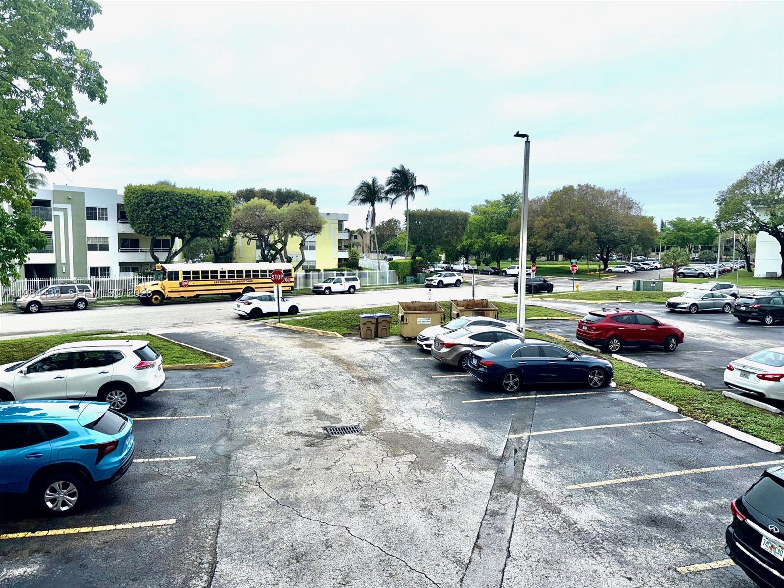 10700 Southwest 108th Avenue, Unit C209 Miami, FL 33176 - Photo 15 of 18 a view of a street with cars