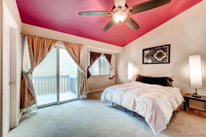 206 South Oman Road Castle Rock, CO 80104 - Photo 15 of 25 a bedroom with a bed and a large window