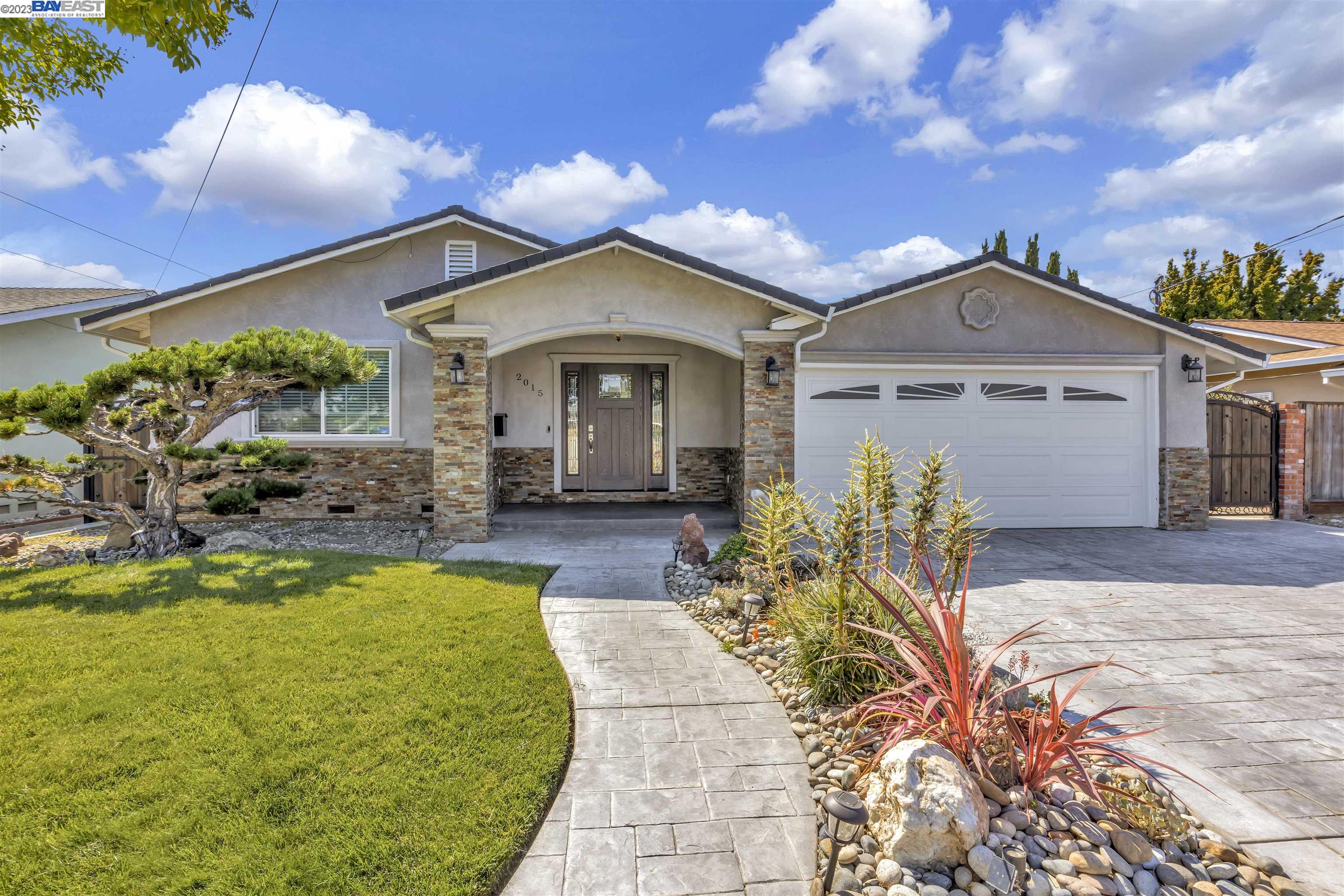 2015 Baylor Street Union City, CA 94587 - Photo 1 of 1 a front view of a house with swimming pool having outdoor seating