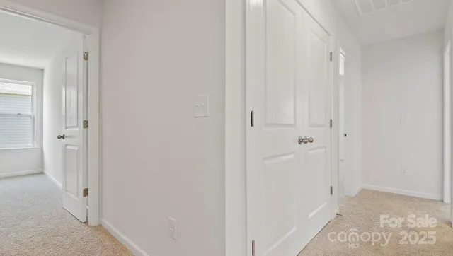 a bathroom with a sink and vanity