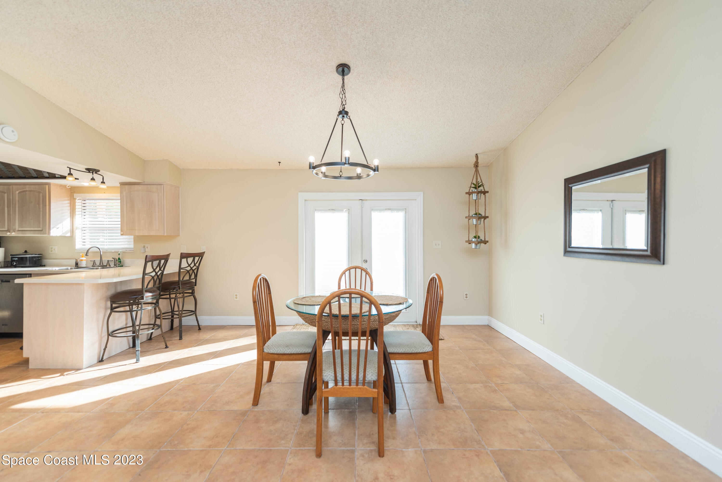 4929 Bridge Road Cocoa, FL 32927 - Photo 16 of 37 a dining room with furniture and window