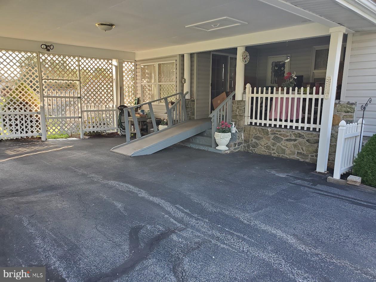 25410 Military Road Cascade, MD 21719 - Photo 5 of 48 Carport leading to deck & Front Door