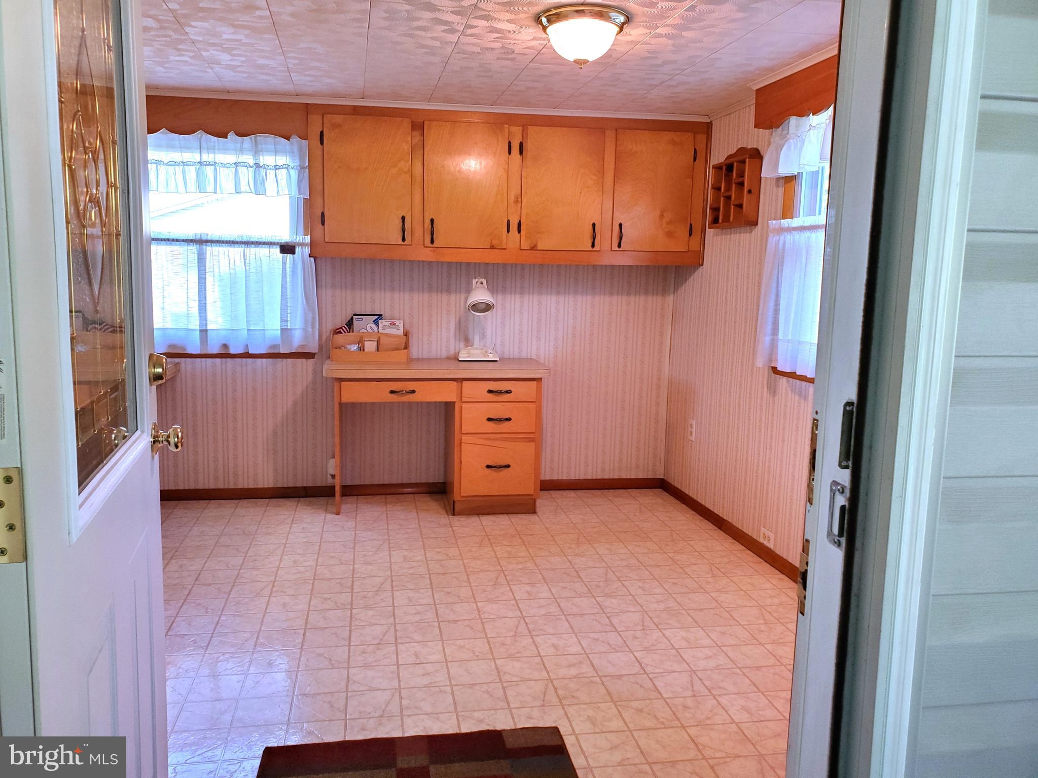 25410 Military Road Cascade, MD 21719 - Photo 8 of 48 Front Porch into Kitchen