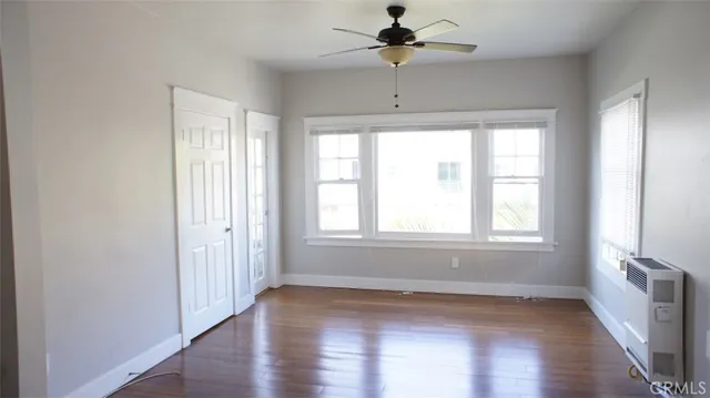 a kitchen with refrigerator and window
