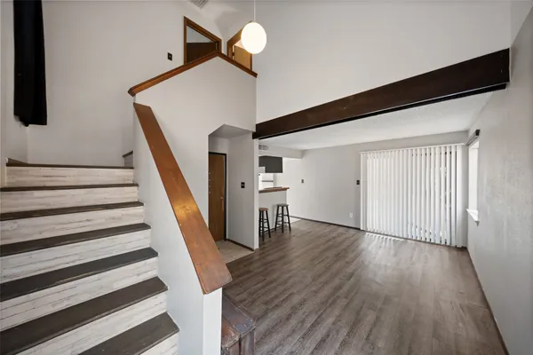 a view of entryway with wooden floor
