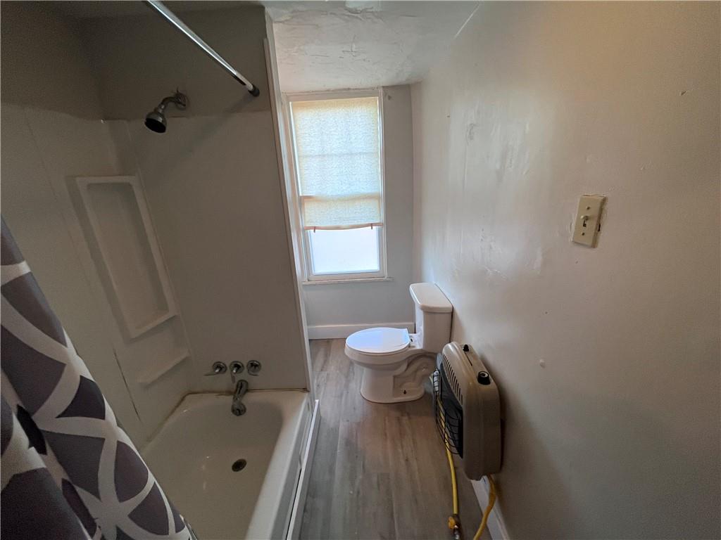 725 Clarissa Street Pittsburgh, PA 15219 - Photo 16 of 17 a bathroom with a sink and a bathtub
