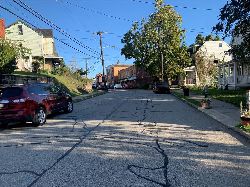 725 Clarissa Street Pittsburgh, PA 15219 - Photo 2 of 17 a view of a street with cars