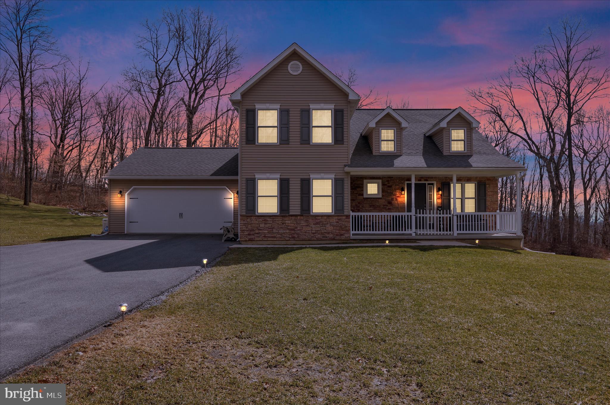 402 Mountainside Road Temple, PA 19560 - Photo 19 of 75 a front view of a house with garden