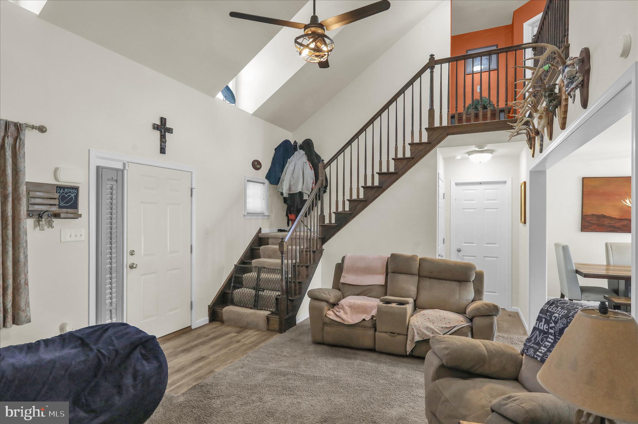 402 Mountainside Road Temple, PA 19560 - Photo 22 of 75 a living room with furniture and stairs